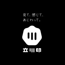 イラスト：立川印ロゴマーク（白文字・タグ上）